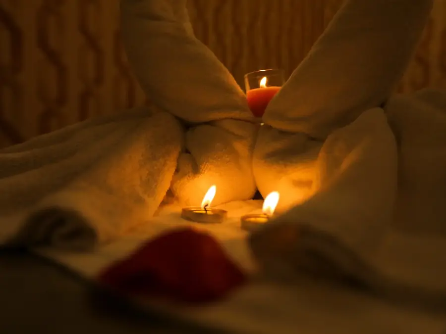 Fresh towels and candle detail prepared before a hammam session